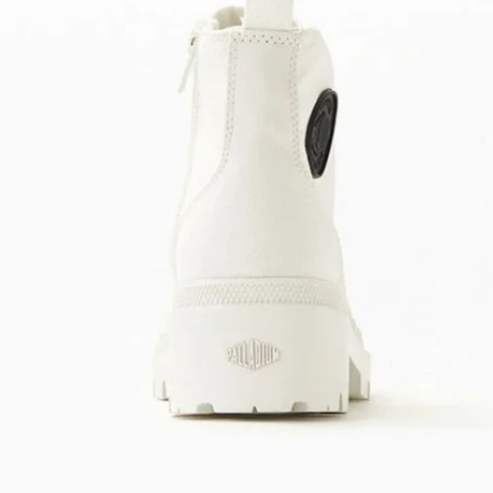 Women cream colored lace up boots